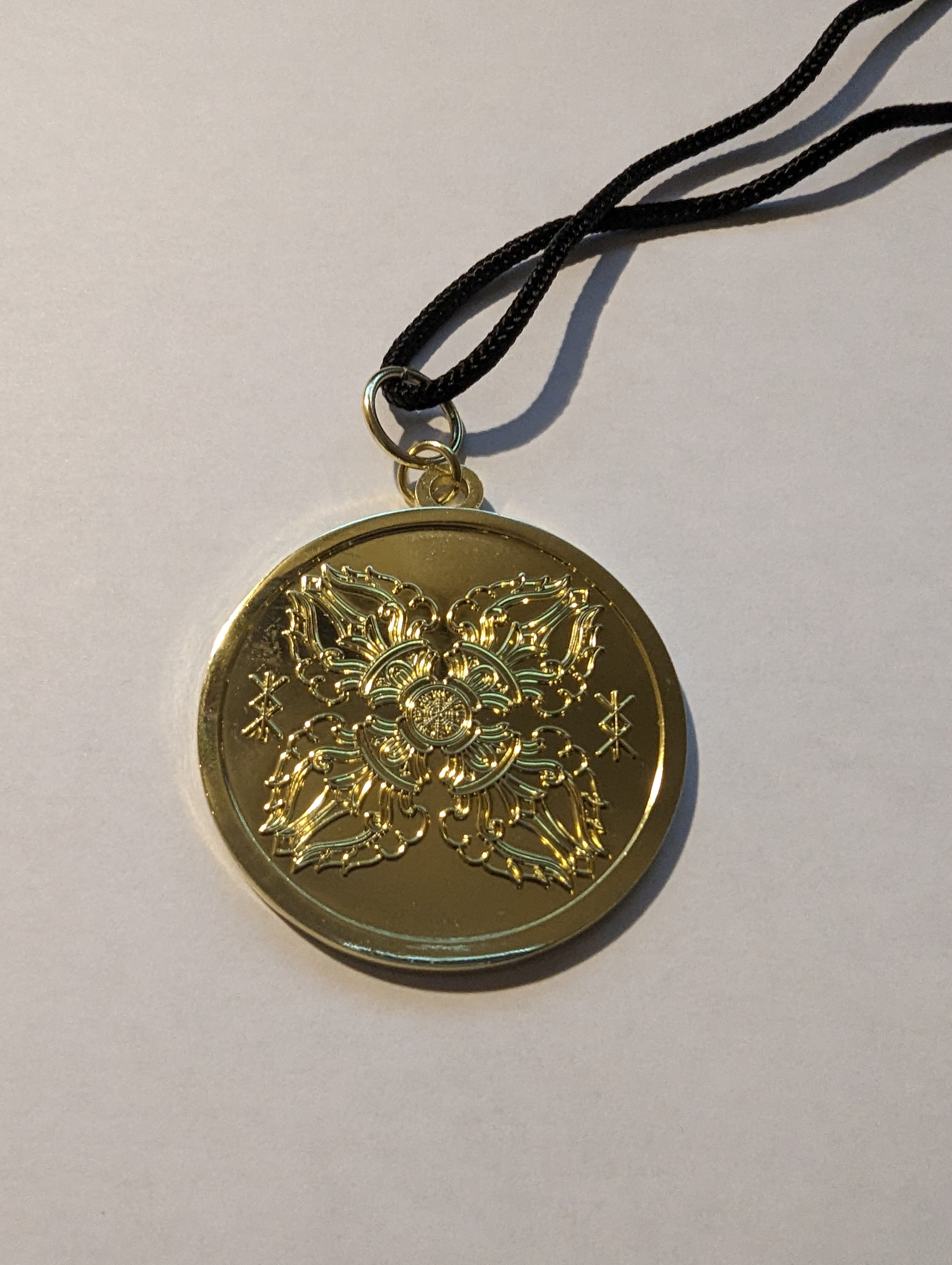 The Protection Reflection medallion