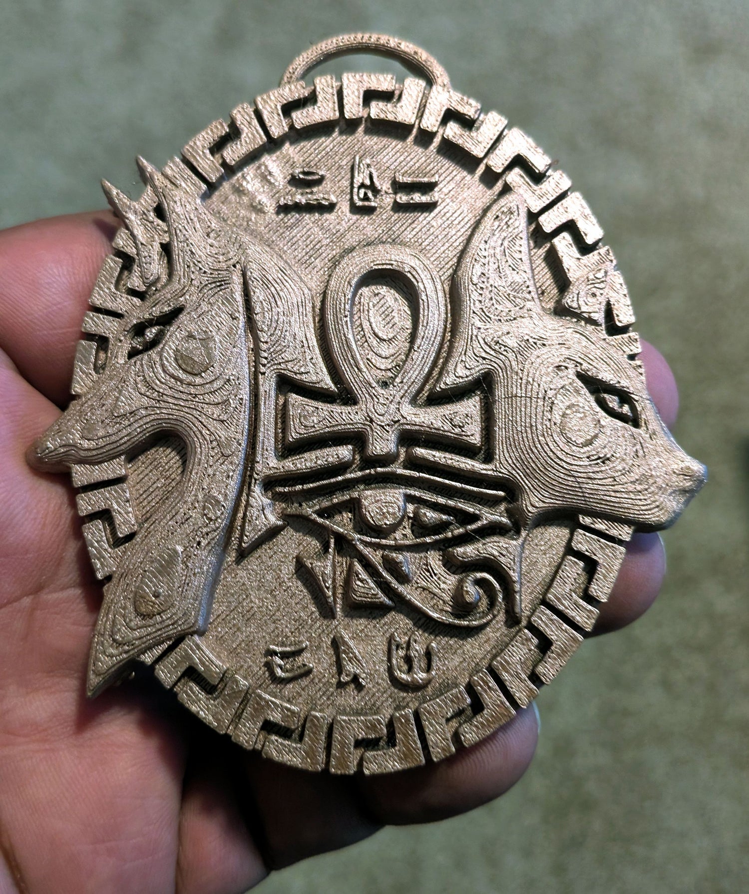 The Anubis and Bast medallion